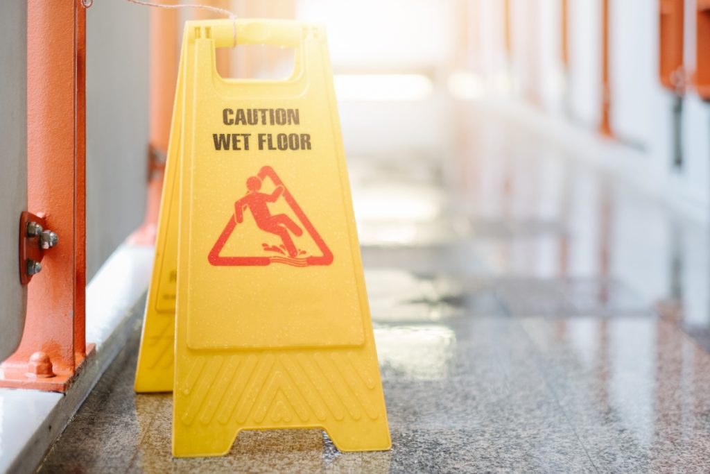 Caution wet floor professional indemnity